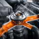 Car engine cooling system cross-section showing malfunctioning thermostat stuck open with orange coolant flowing through valve