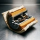 Precision thermostat component wrapped in ceramic fiber and polymer foam insulation, cross-section exposing copper wiring and metal housing on a stainless steel workbench.